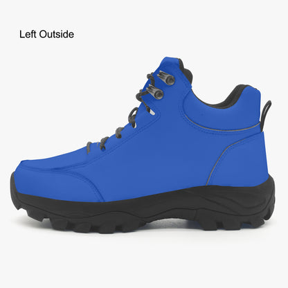 Blue hiking boot with black sole on a white background