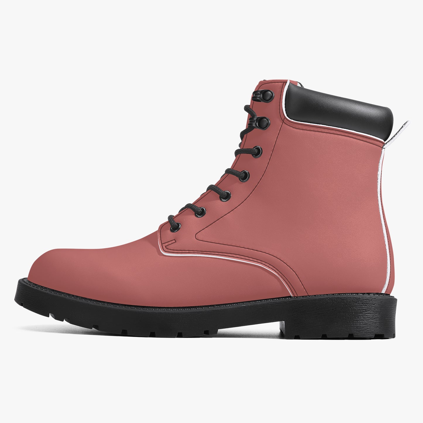 Pink boot with black sole on a white background