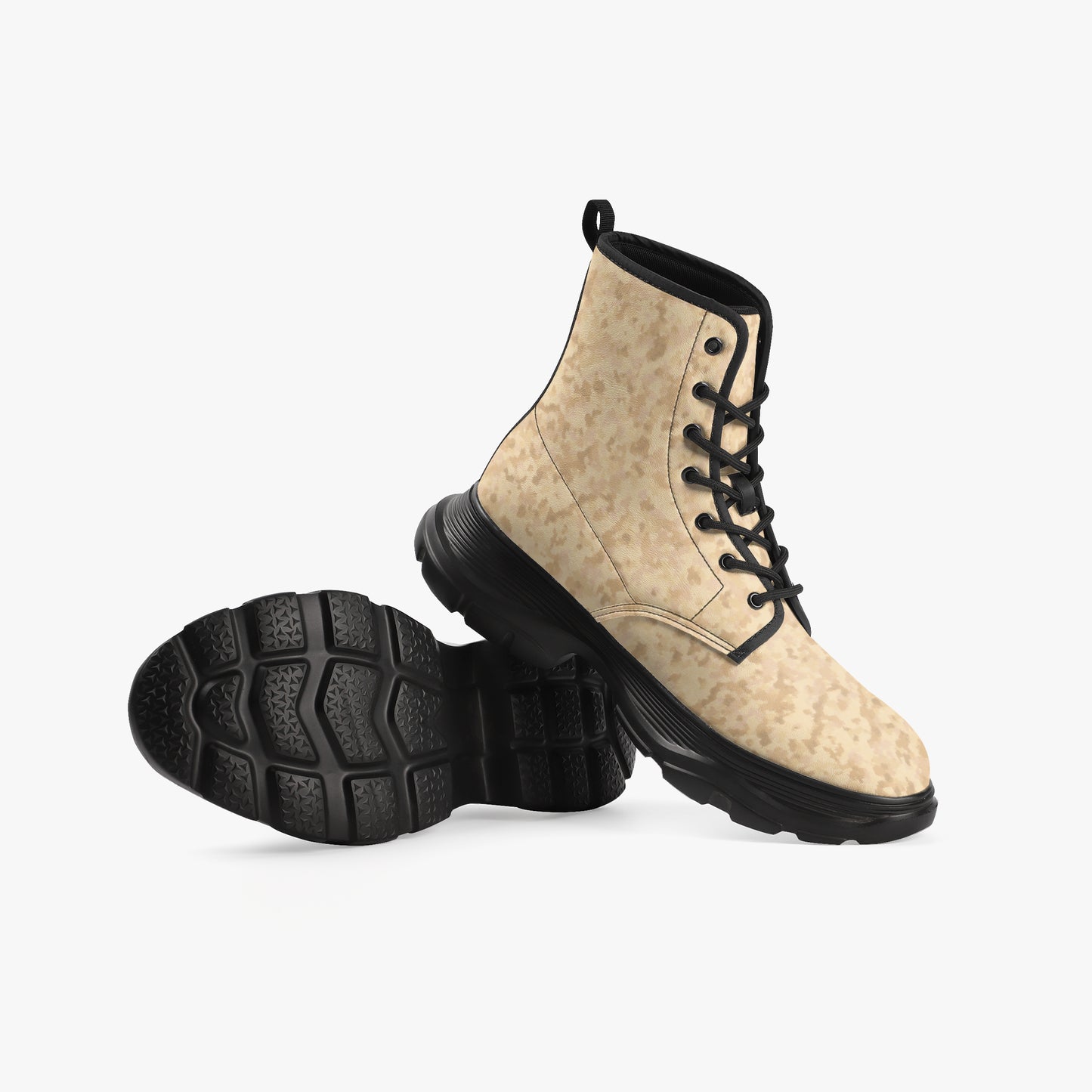 Camoflauge boots with black laces and sole on a light gray background, Camo boots