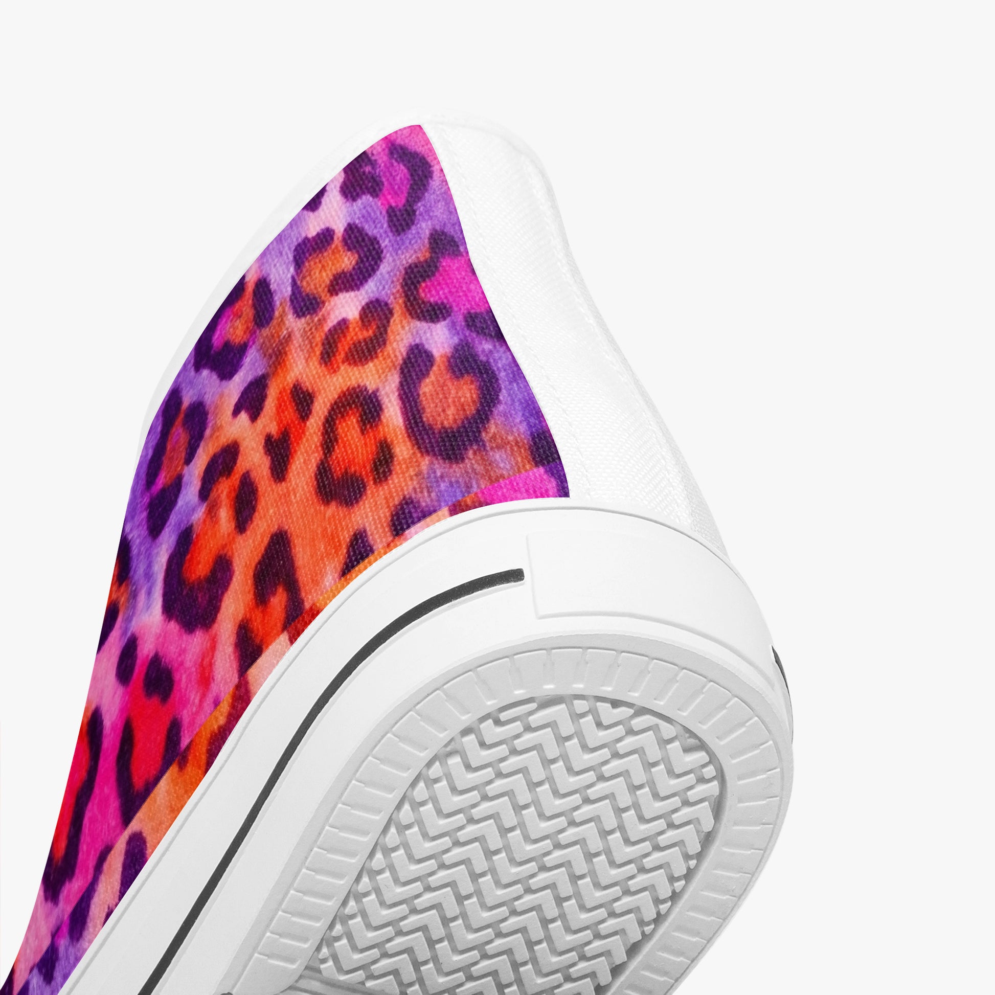Sneaker with a colorful leopard print heel on a white background