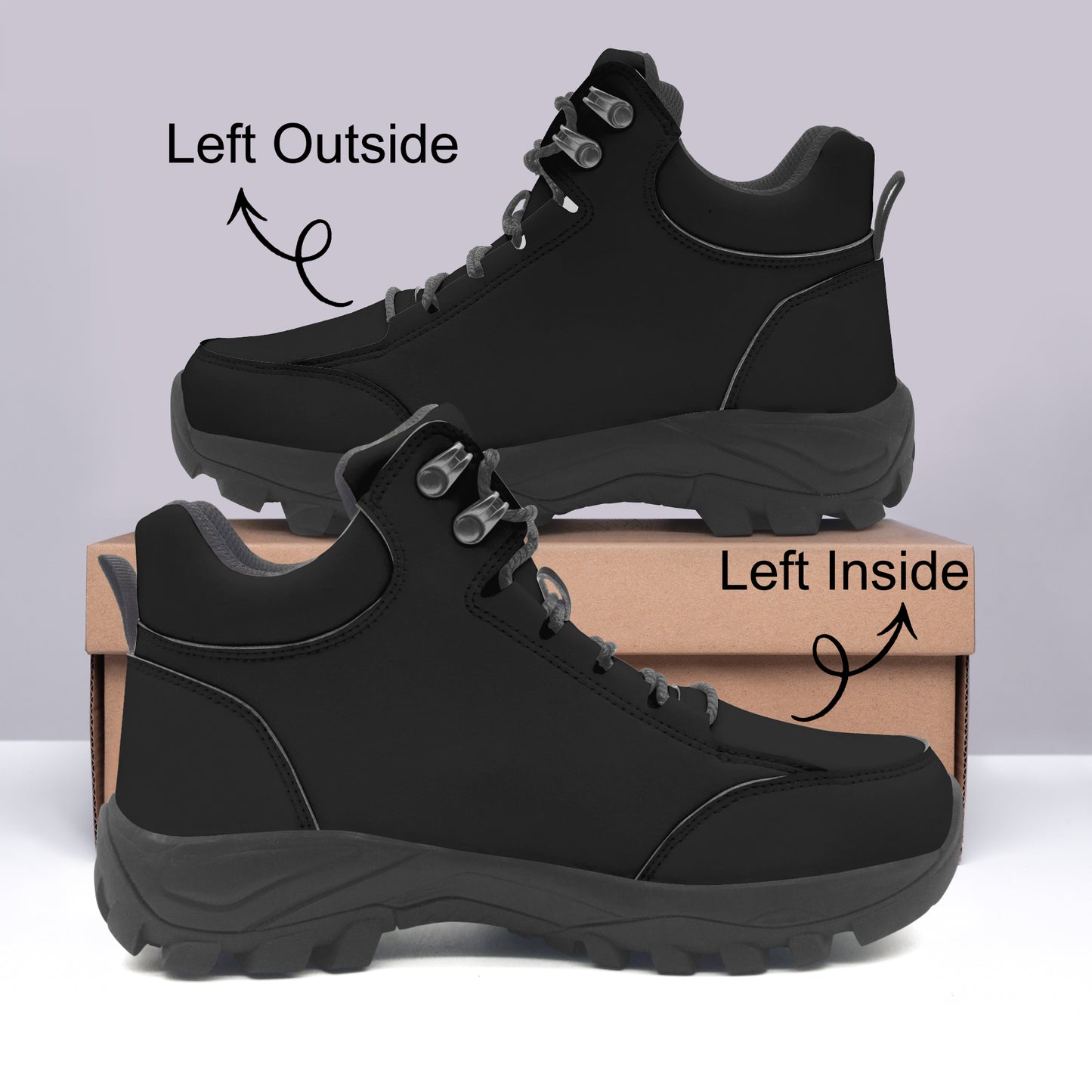 Black hiking boots on a light gray background