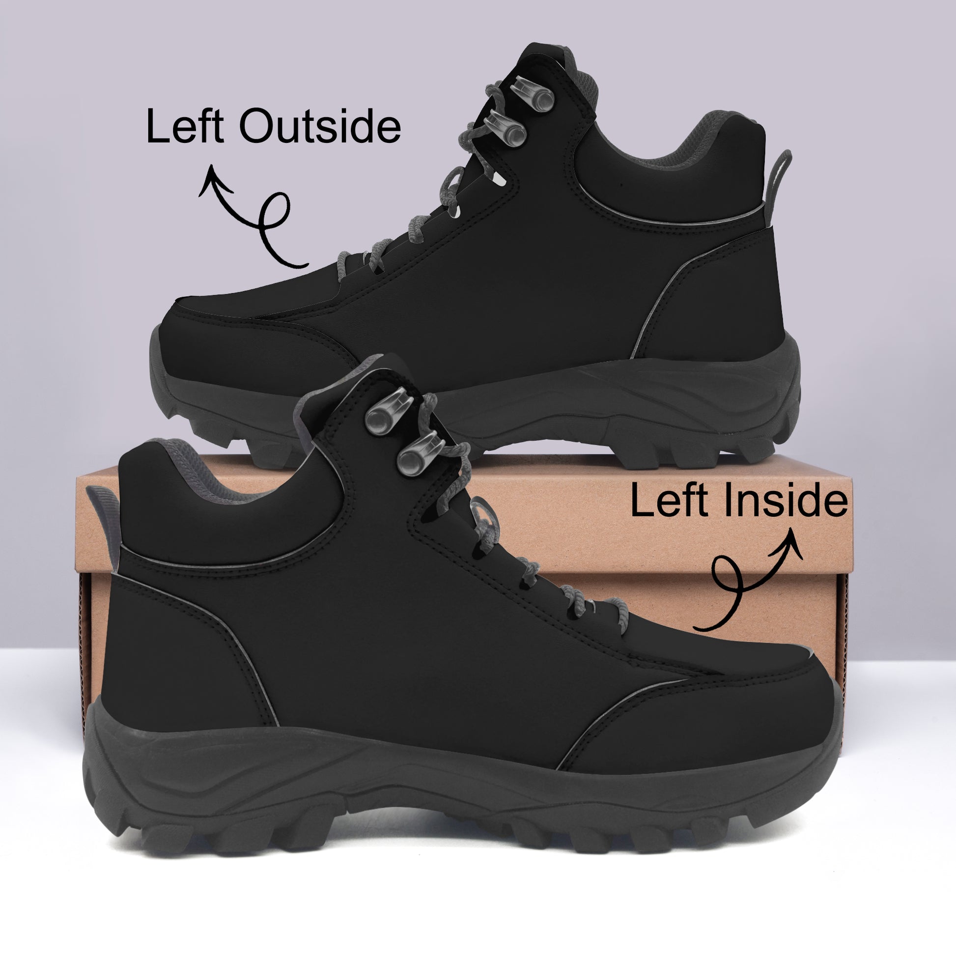 Black hiking boots on a light gray background