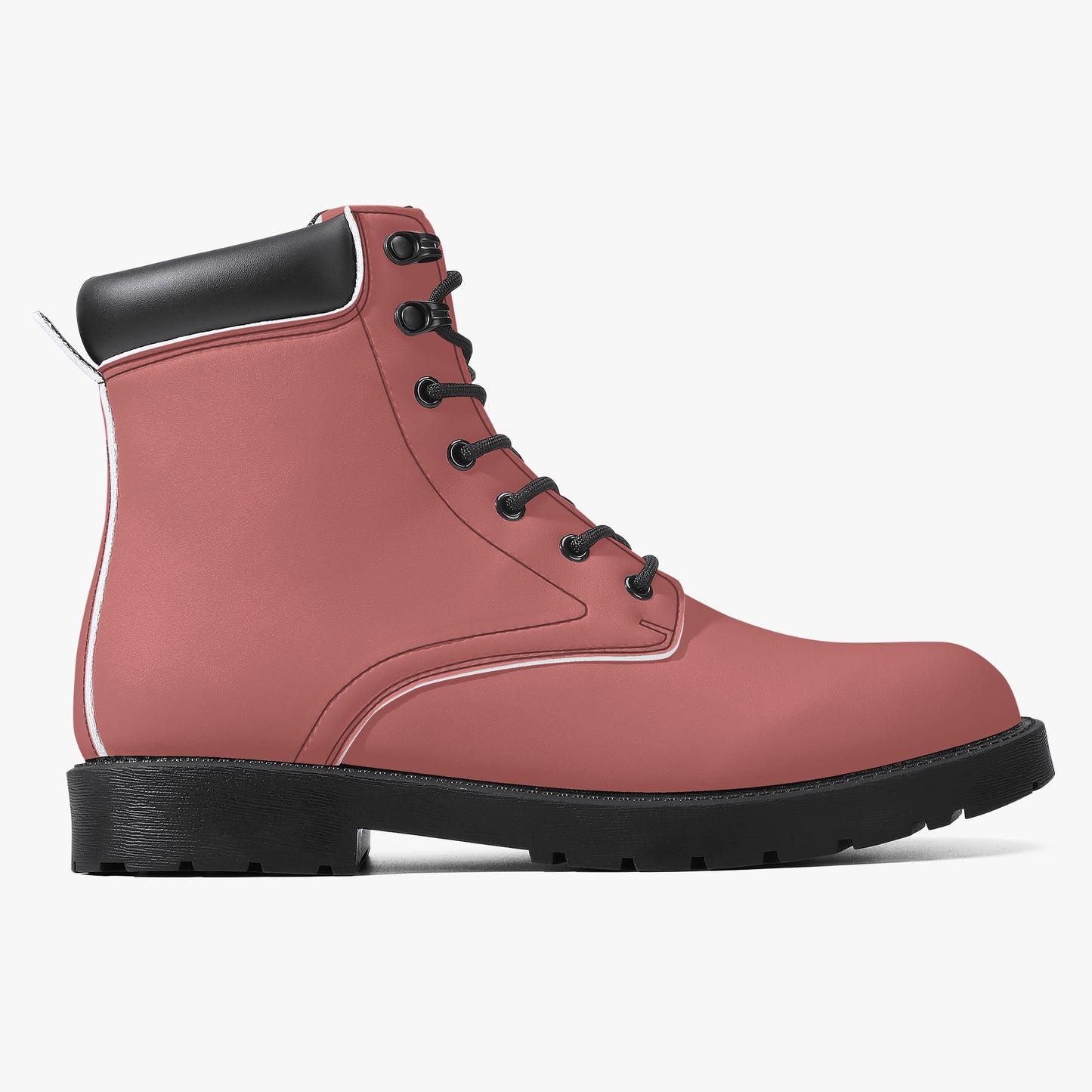 Pink boot with black sole on a white background