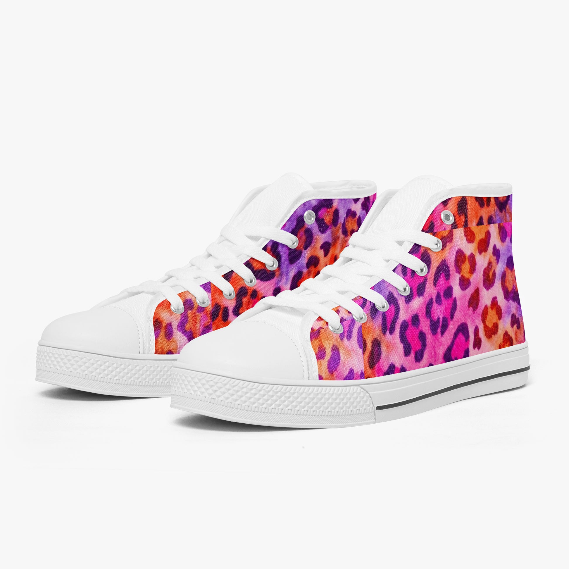 White sneakers with colorful leopard print pattern on a white background