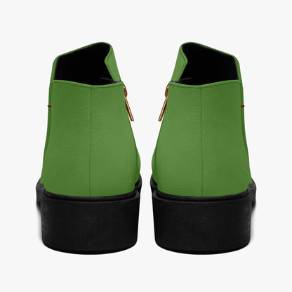 Green ankle boots with black soles on a white background, Zipper Boots
