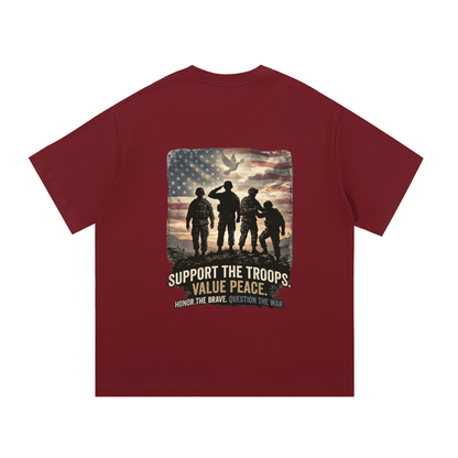 Maroon t-shirt with graphic of soldiers and text 'Support the Troops, Value Peace' on a white background.
Support The Troops T-Shirt
Protest The War