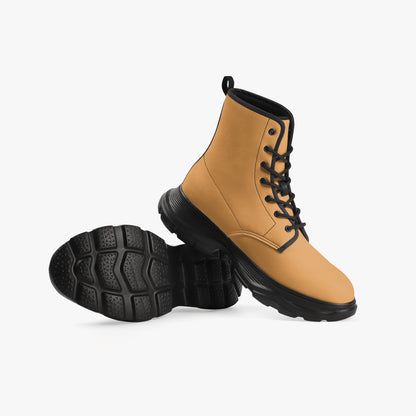 Tan boot with black sole on a white background