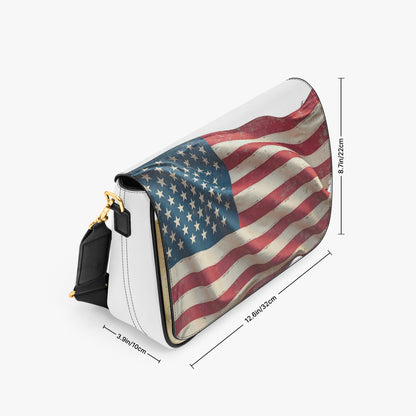 Handbag with American flag design and measurements on a white background