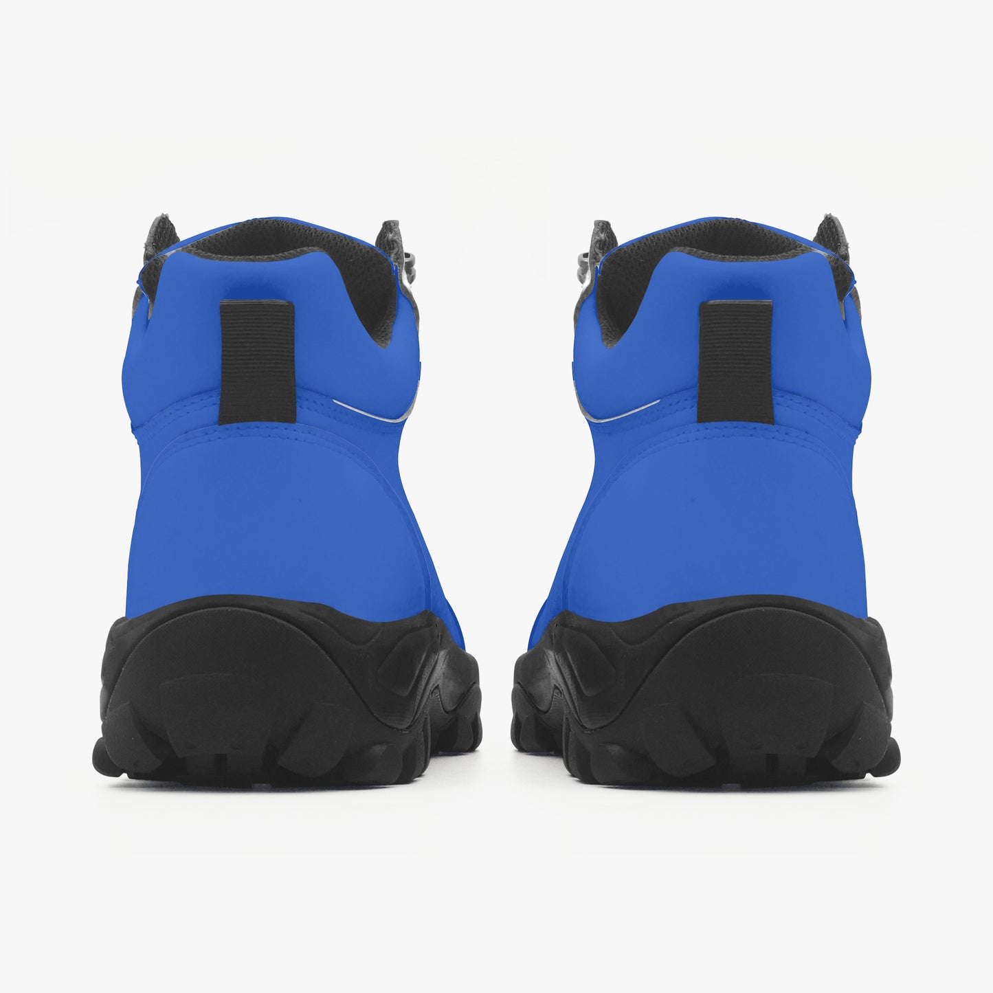 Blue and black hiking boots on a white background, 