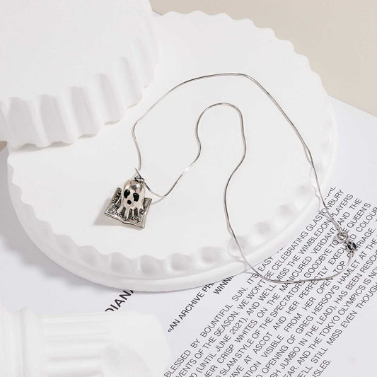 Silver ghost pendant necklace on a white background- Antique Oxide Finish