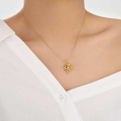 Gold octopus necklace on a chain on neck- Front View