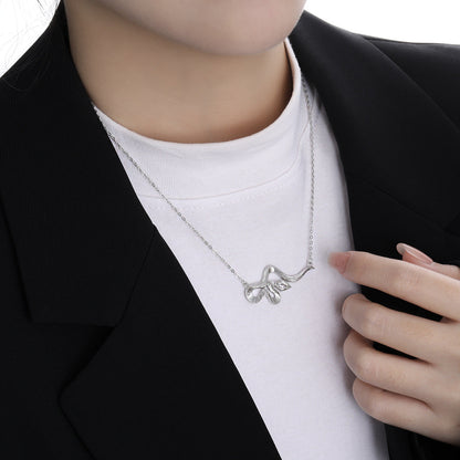 Modern Rhombus CZ curved snake necklace in 925 sterling silver with cubic zirconia pendant, Displayed on Neck