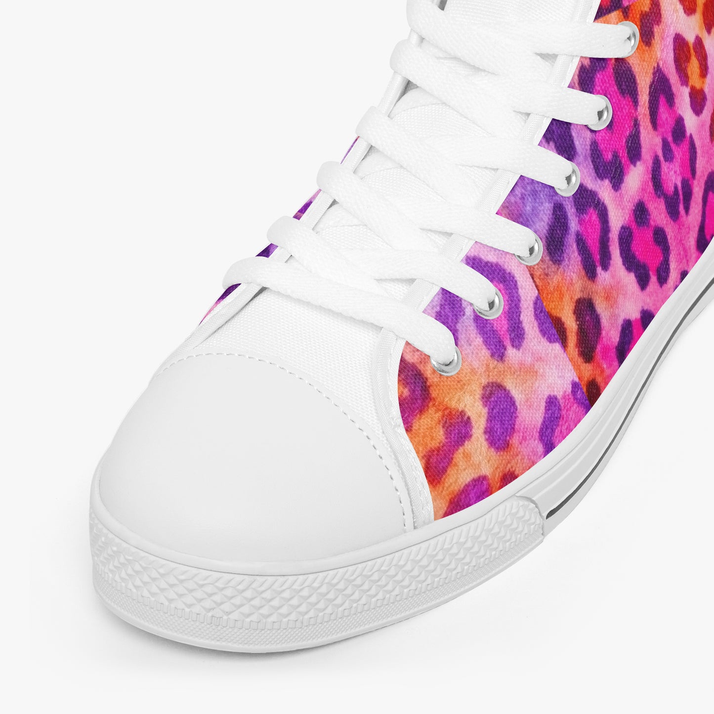 White sneaker with colorful leopard print on a white background