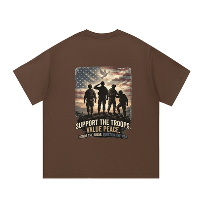 Brown t-shirt with a graphic of soldiers and text on the back, on a white background.
Support The Troops T-Shirt
Protest The War