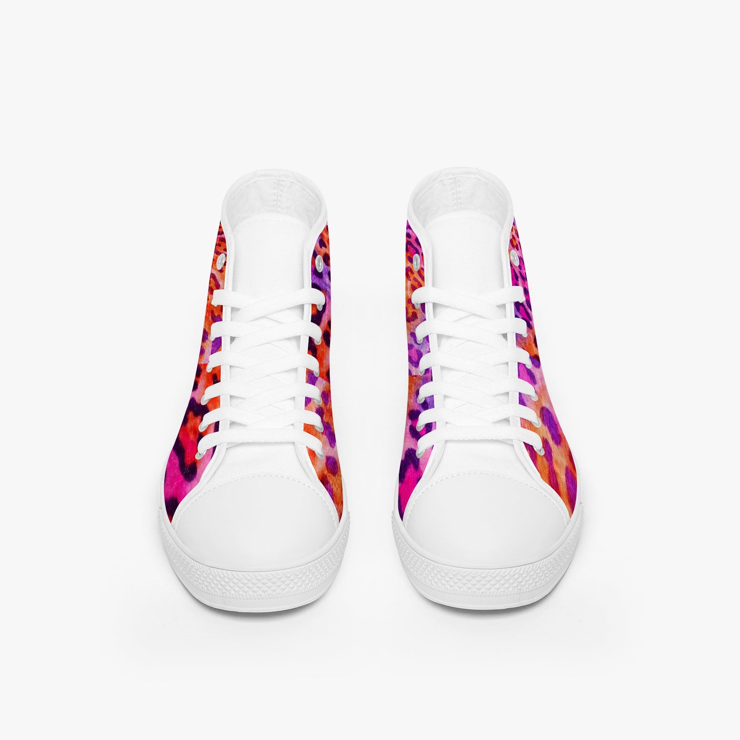 White sneakers with colorful patterned soles on a white background