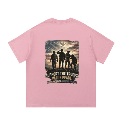 Pink t-shirt with a graphic of soldiers and an American flag on the back, on a white background. 
Support The Troops T-Shirt
Protest The War