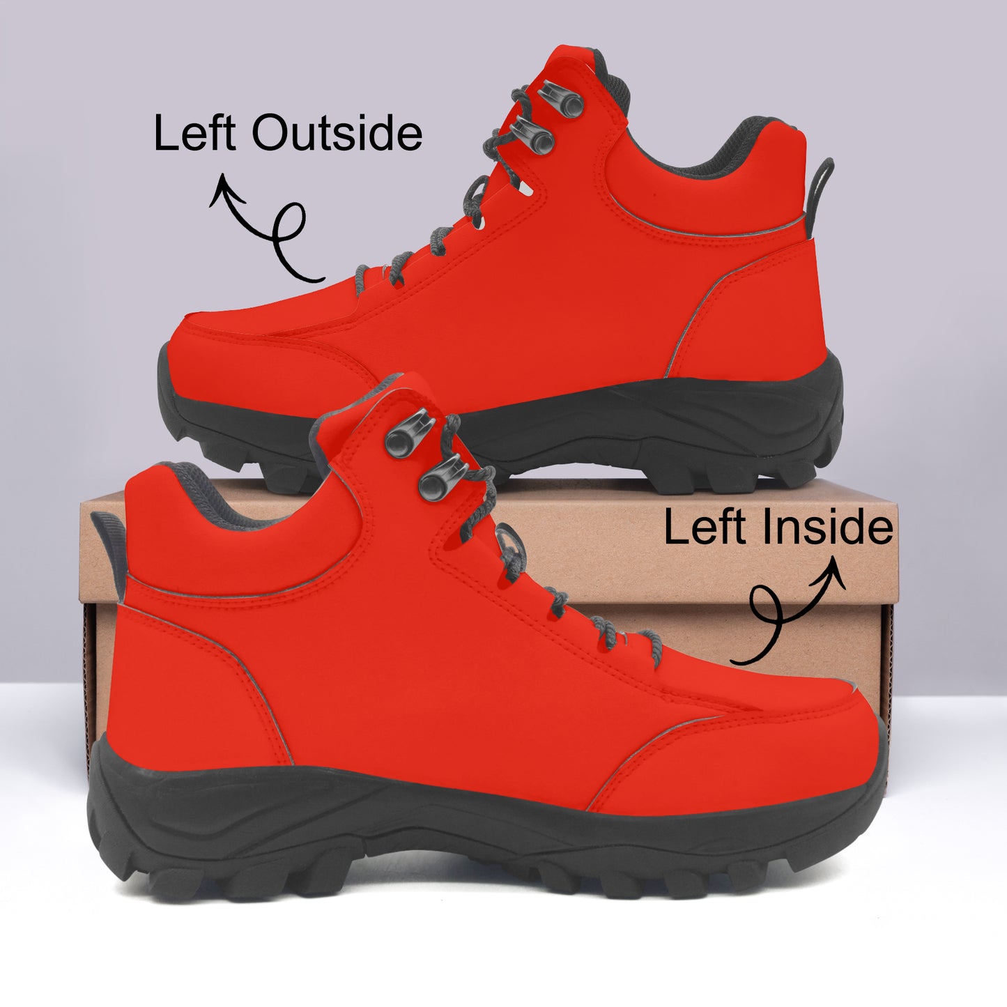 Red hiking boots with black soles on a light gray background