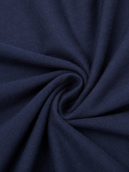 Close-up of dark blue T- Shirt fabric with folds